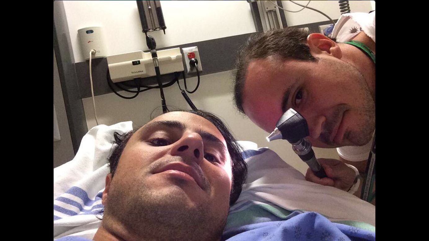 Formula One driver Felipe Massa, who was injured in a high-speed crash on the last lap of the Canadian Grand Prix, <a href="https://twitter.com/MassaFelipe19/status/476248263415578624/photo/1" target="_blank" target="_blank">tweeted a photo</a> from his hospital bed on Monday, June 9. "We need to find the way to smile even on the difficult day," he said.