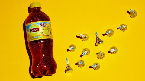 There are 32 grams of sugar in this 20-ounce bottle of iced tea. Each of these 12 Hershey's Kisses contains approximately 2.5 grams of sugar. 