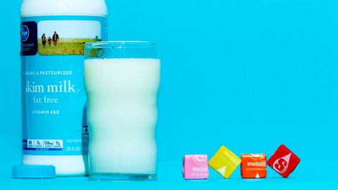 An 8-ounce glass of skim milk has about 11 grams of sugar. A single Starburst candy has 2.7 grams. 