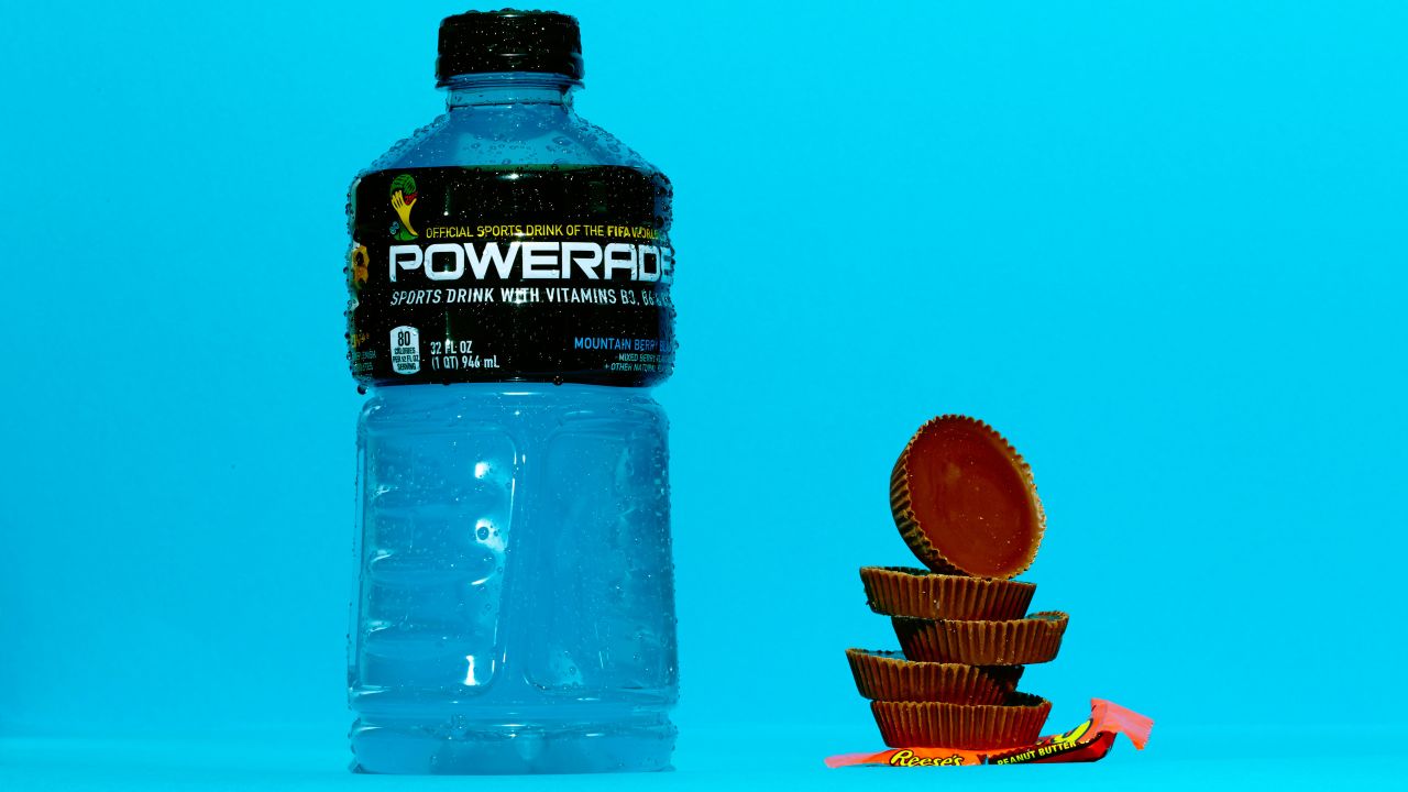 <strong>Sports drink: Powerade Mountain Berry Blast.</strong><br />Powerade's Mountain Berry Blast also has 56 grams of sugar. Each of these five Reese's cups contains about 11 grams of sugar. 