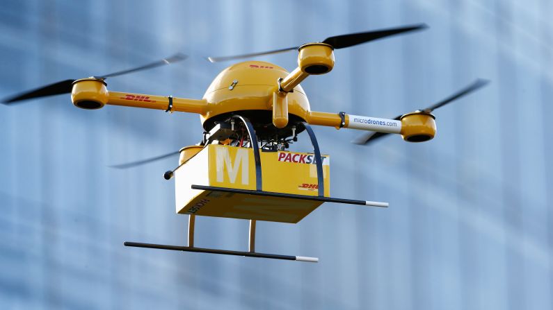 A drone delivers medicine from a nearby pharmacy to the Deutsche Post headquarters in Bonn, Germany, on December 9, 2013. The company was testing the viability of using drones to deliver small packages over short distances. Online retailer Amazon has also <a href="index.php?page=&url=http%3A%2F%2Fwww.cnn.com%2F2013%2F12%2F02%2Ftech%2Finnovation%2Famazon-drones-questions%2Findex.html">announced plans</a> to start using unmanned flying vehicles.