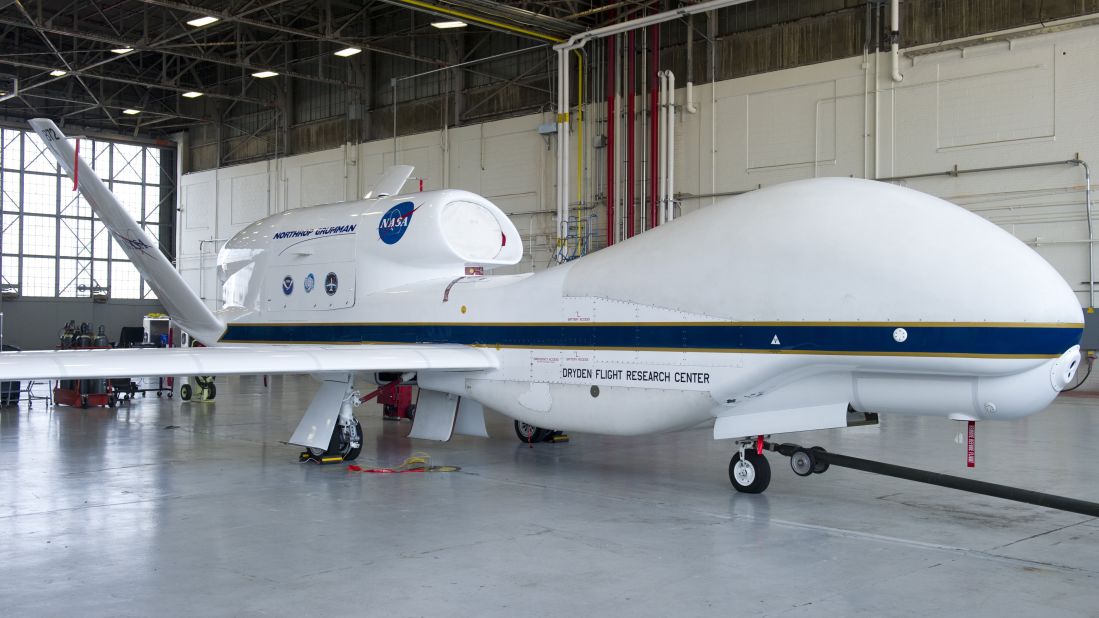 A NASA Global Hawk drone sits in an airplane hangar during a Hurricane and Severe Storm Sentinel, or HS3, mission at NASA's Wallops Flight Facility in Wallops Island, Virginia, on September 10, 2013. The HS3 mission uses two of the unmanned aircraft to fly over tropical storms and hurricanes to monitor weather conditions.