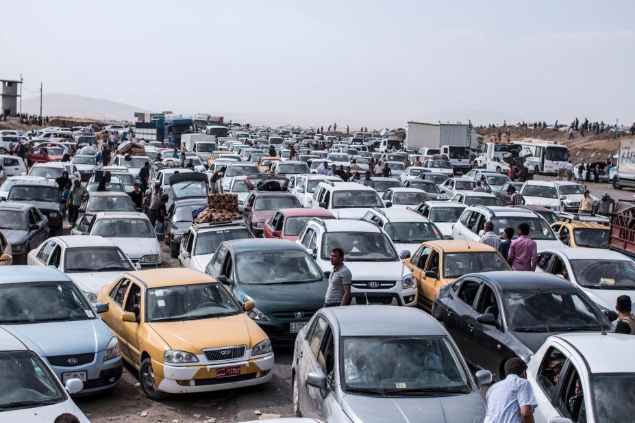 Vehicles clog a highway as refugees flee Mosul on Tuesday, June 10. 