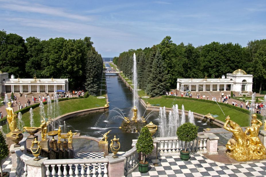 At the Peterhof Palace Garden in St. Petersburg, a famed view looks across the Grand Cascade and Samson Fountain through a canal to the sea.