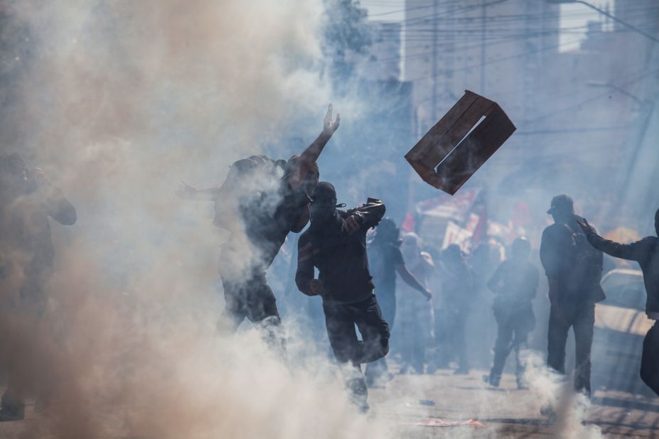 Demonstrators clash with police during the protest.