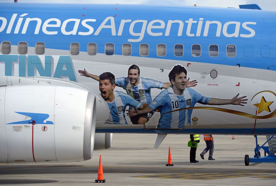"Vamos Argentina" says the Aerolineas Argentinas Boeing 737. It also sports the I-just-scored-a-wondergoal expressions of Lionel Messi, Gonzalo Higuain and Sergio Aguero.