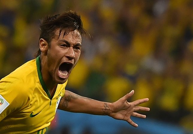 Neymar celebrates. He had two goals in the game, which was played in Sao Paulo, Brazil.