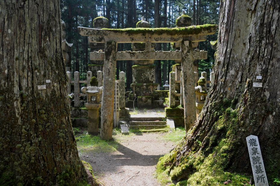 The walk to Kobo Daishi's mausoleum is filled with more than 200,000 gravestones, monuments and memorials (no bodies are buried here), all sharing space with moss-covered Shinto torii gates and thick forest.