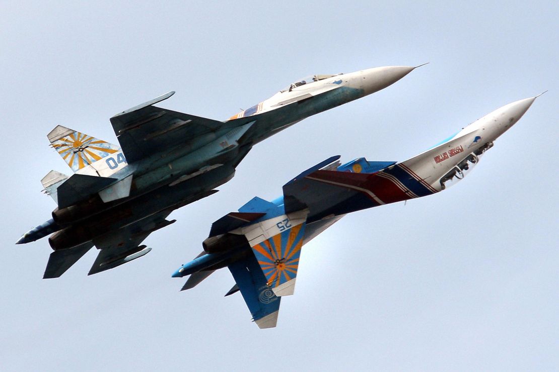 A Russian Air Force flight demonstration team perform with their SU-27 jet fighters over St. Petersburg, Russia.