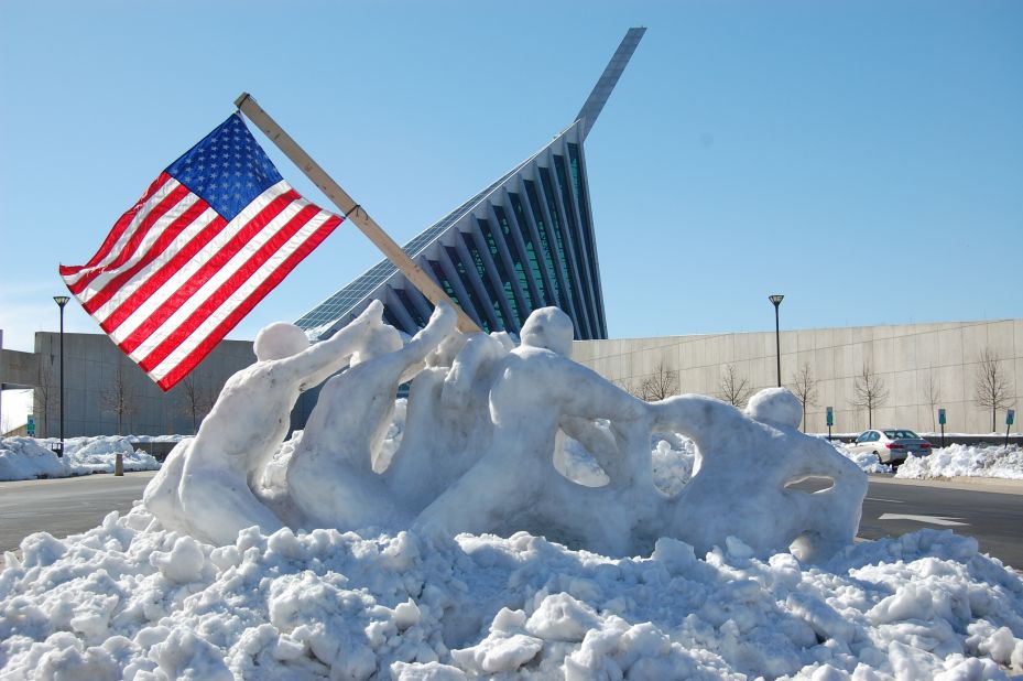 <a href="http://ireport.cnn.com/docs/DOC-1085440">Angie McCrary </a>photographed this life-size snow sculpture of troops raising a flag at Iwo Jima in Triangle, Virginia, on February 14. The sculpture was created by two Marines, Tim Lewis and Derek Reynolds, for the National Museum of the Marine Corps.