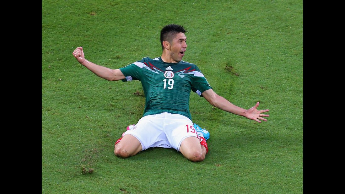 Oribe Peralta celebrates after scoring the only goal in Mexico's 1-0 win over Cameroon in Natal, Brazil. 