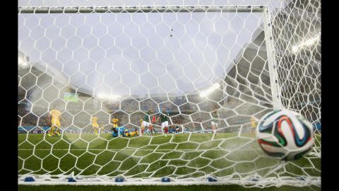 The ball sits in the back of the net after Peralta's goal.