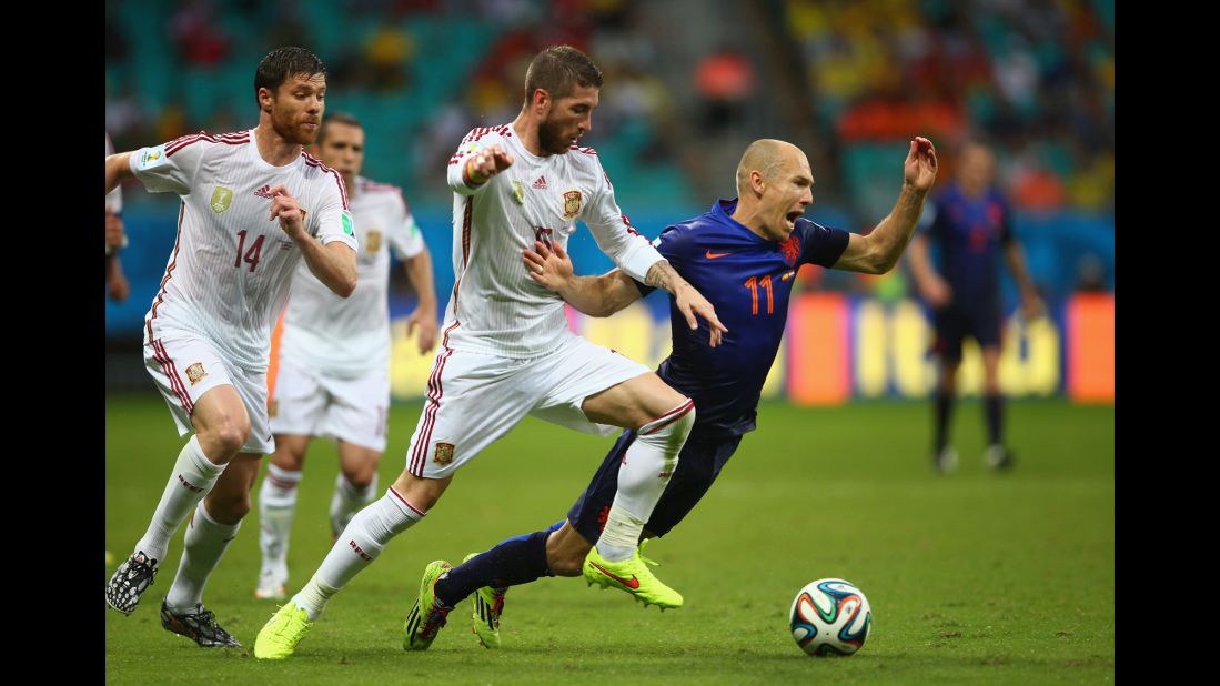 Robben is felled by Sergio Ramos of Spain.