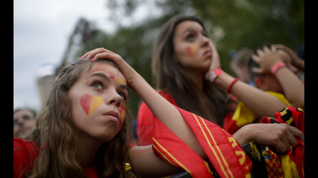 Spain supporters react while watching the game in Madrid.