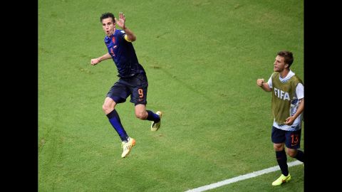Netherlands forward Robin van Persie, left, celebrates after scoring his second goal of the match to put the Dutch up 4-1. 