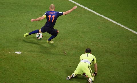 Dutch forward Arjen Robben scores the final goal in the Netherlands' victory. Robben had two goals in the match.