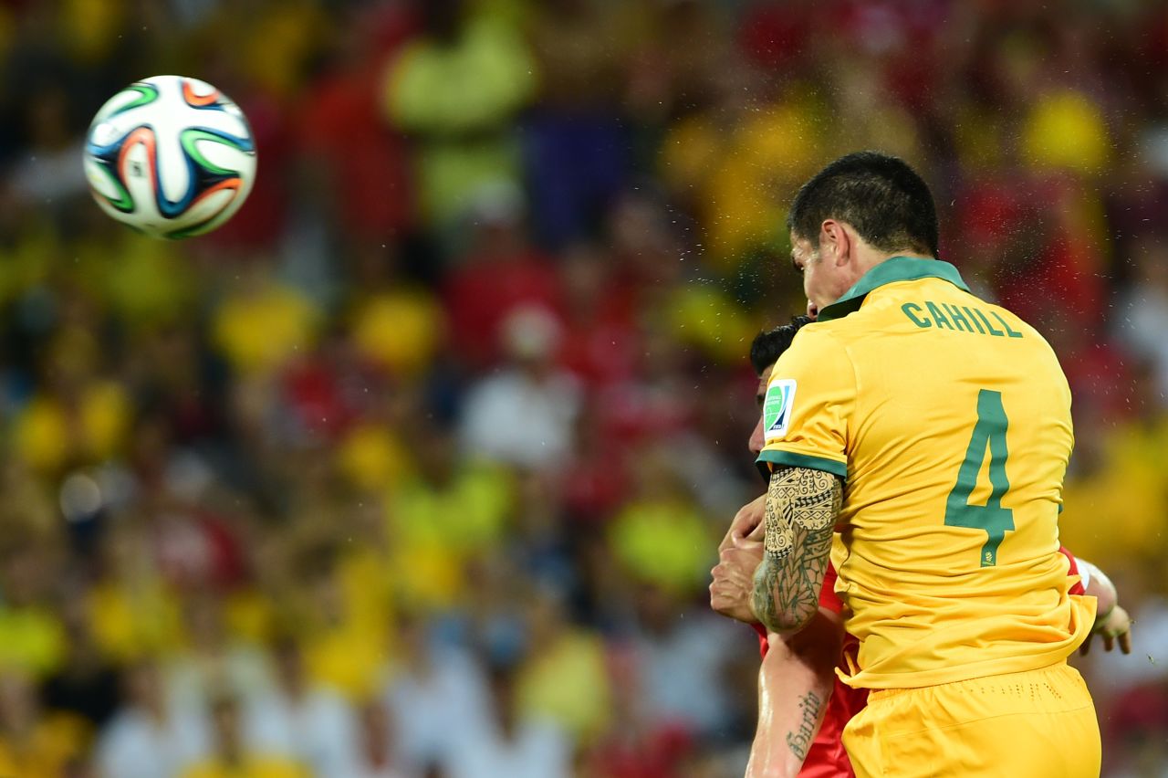 Australian forward Tim Cahill heads in a first-half goal to cut Chile's lead to one. Chile had a 2-0 lead at the time.