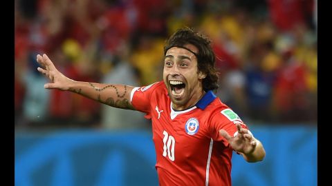 Jorge Valdivia celebrates after scoring a goal to give Chile a 2-0 lead. The goal came less than two minutes after Chile's first goal.