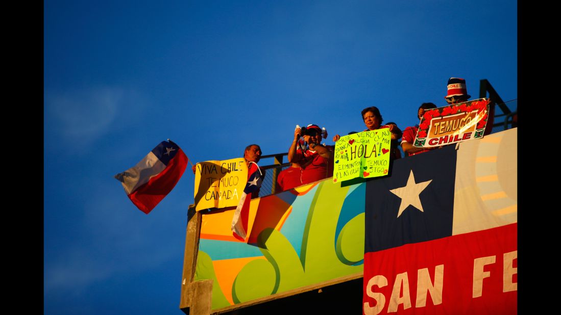 Chile fans hold up banners before the start of the match. 