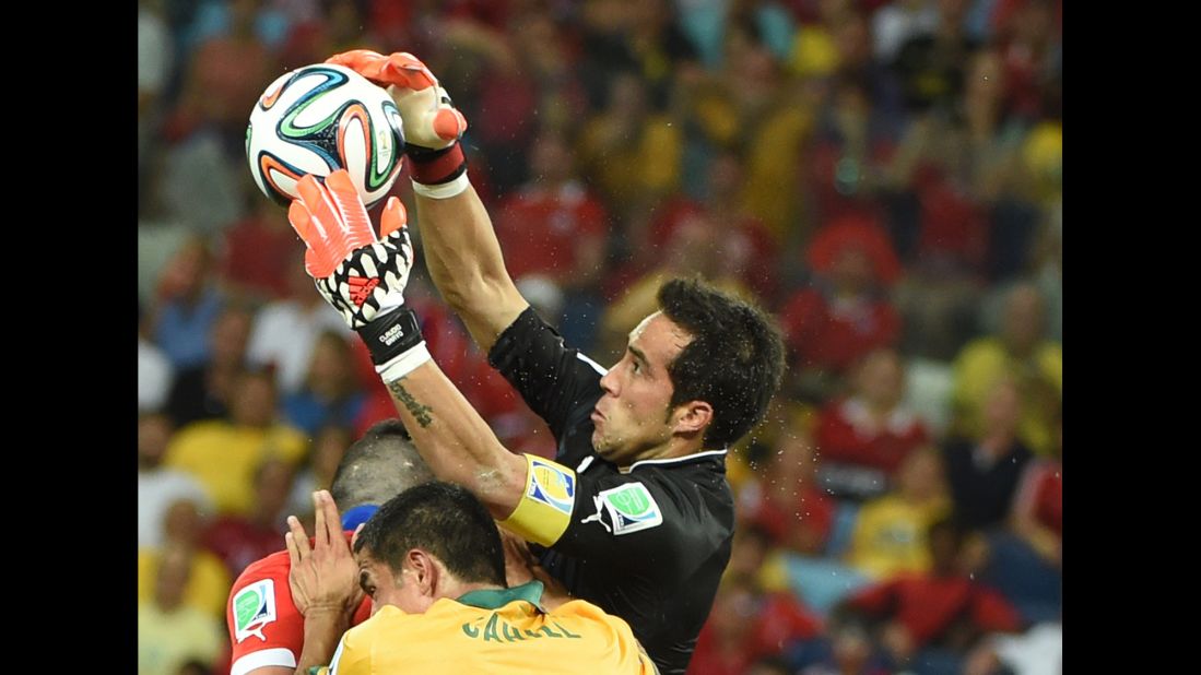 Chile goalkeeper Claudio Bravo saves the ball.