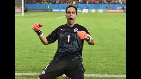 Goalkeeper Claudio Bravo of Chile celebrates after his team scored at the end of the match against Australia on Friday, June 13. Chile won 3-1. Friday was the second day of the soccer tournament, which is being held in 12 cities across Brazil. <a href="http://www.cnn.com/2014/06/12/football/gallery/world-cup-0612/index.html" target="_blank">See Thursday's best photos</a>