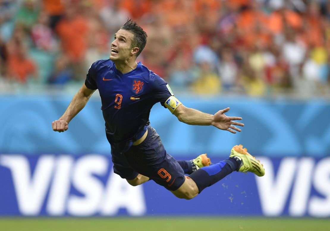 Netherlands forward Robin van Persie scores against Spain.