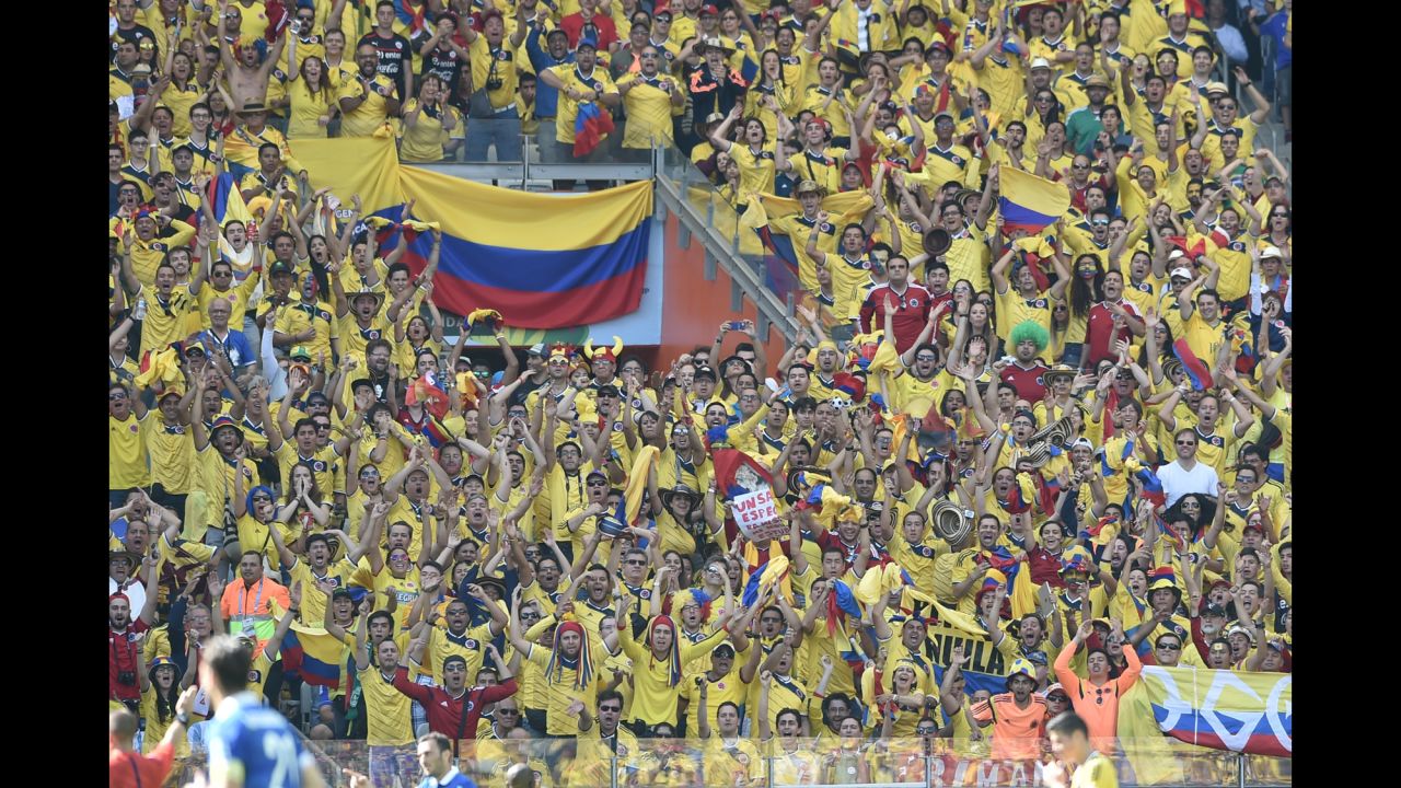 Colombian fans cheer from the stand. 