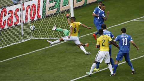 Colombia forward Teofilo Gutierrez scores the second goal.