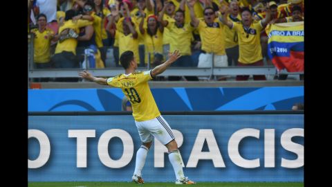Colombia midfielder James Rodriguez celebrates after scoring his team's third and final goal during a match against Greece on June 14 in Belo Horizonte, Brazil. Colombia won 3-0.