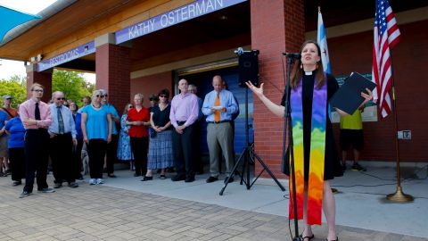 Pastor Carol Hill from Epworth United Methodist Church speaks during a marriage-equality ceremony at the Kathy Osterman Beach in Chicago on June 1, 2014. The date marked the first day that all of Illinois' 102 counties could begin issuing marriage licenses to same-sex couples.