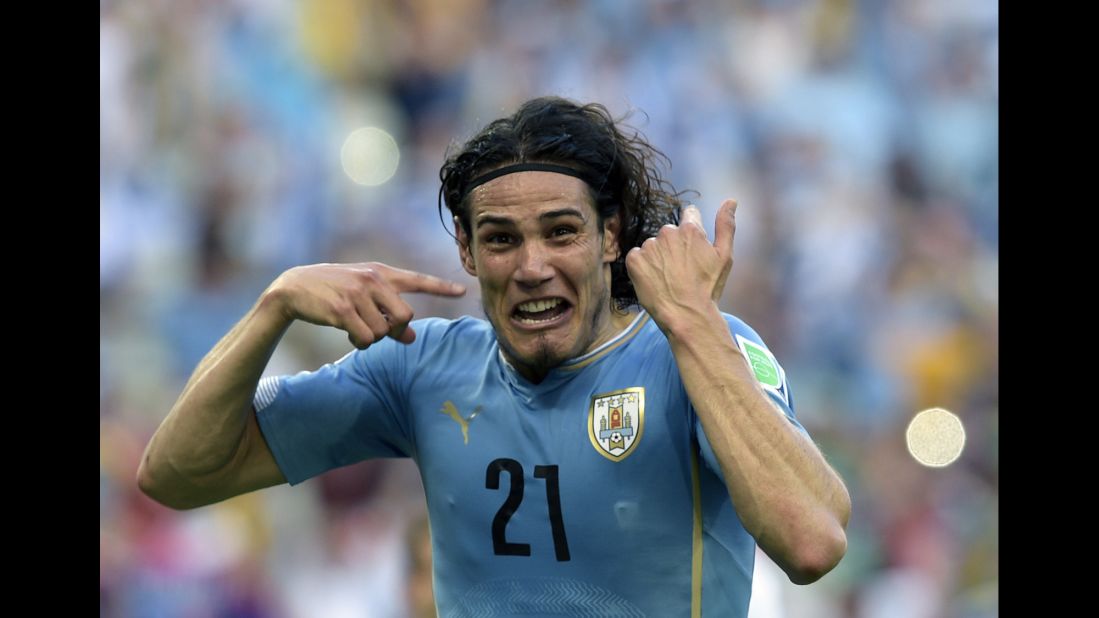 Uruguay forward Edinson Cavani celebrates after scoring in the 23rd minute.