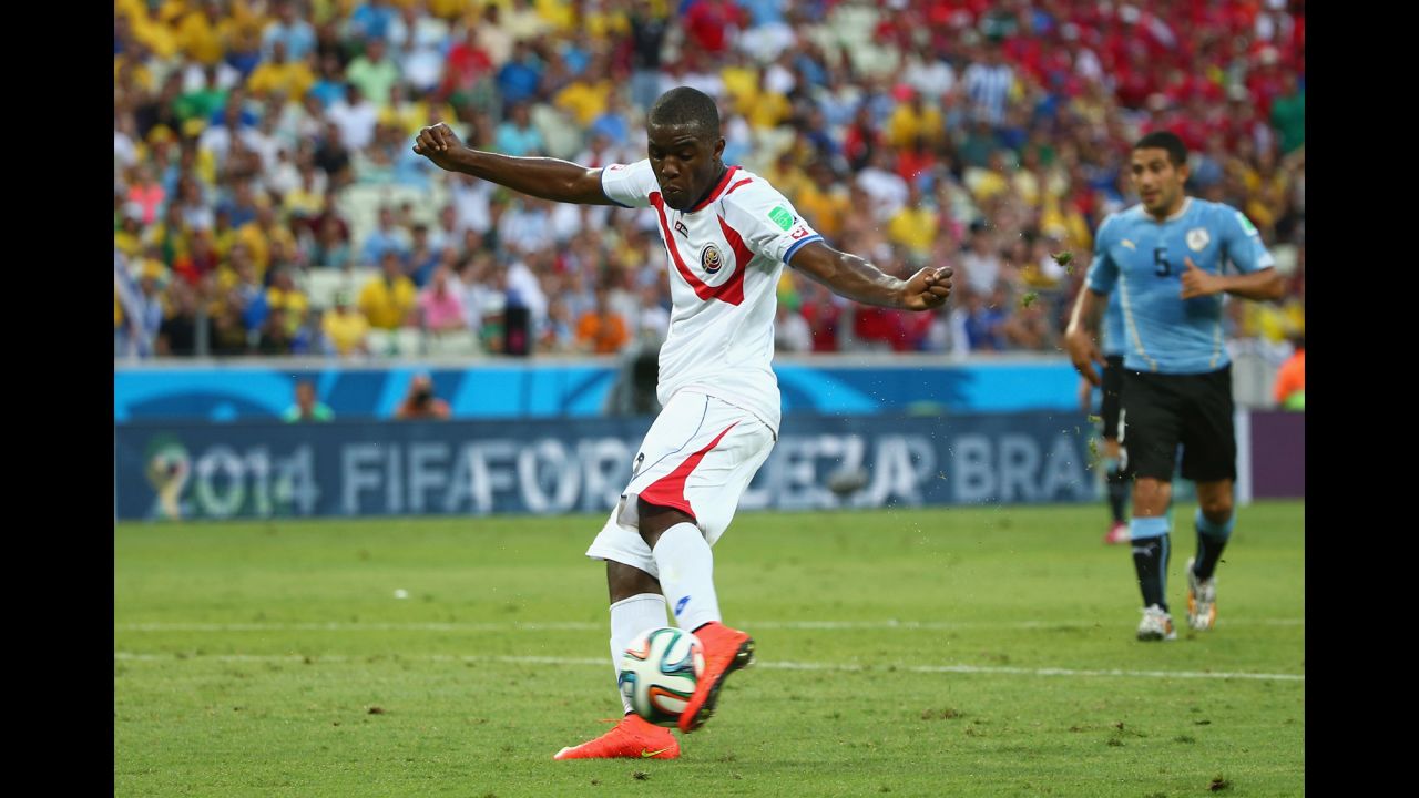 Joel Campbell scores Costa Rica's equalizer against Uruguay. 