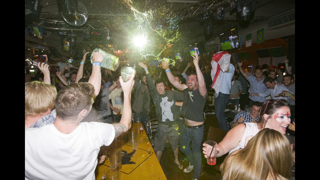 England supporters celebrate in the Walkabout bar in central London after Daniel Sturridge's 37th-minute goal.