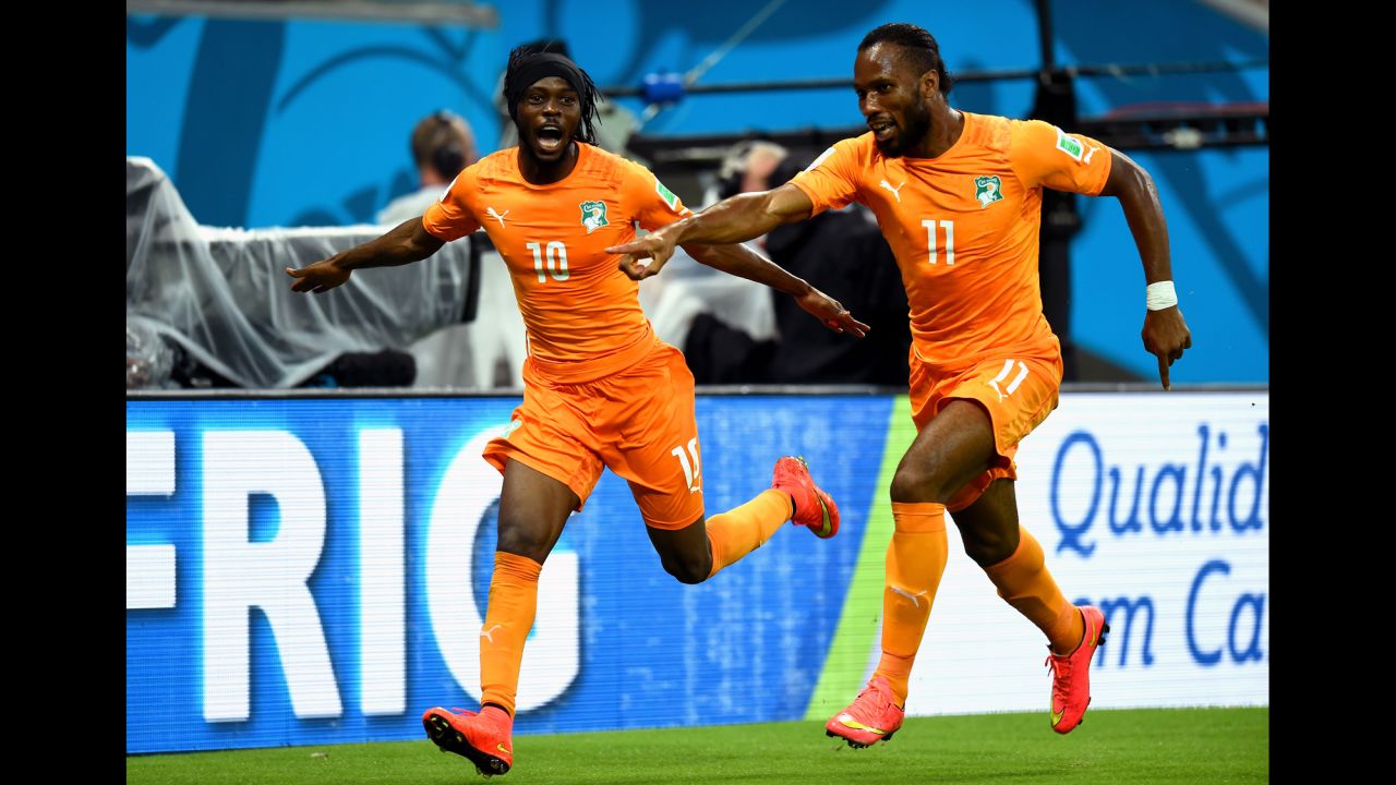 Gervinho, left, celebrates with Didier Drogba of the Ivory Coast after scoring the team's second goal in their World Cup match against Japan on Saturday, June 14. Ivory Coast trailed 1-0 at halftime but came back to win 2-1 in Recife, Brazil.