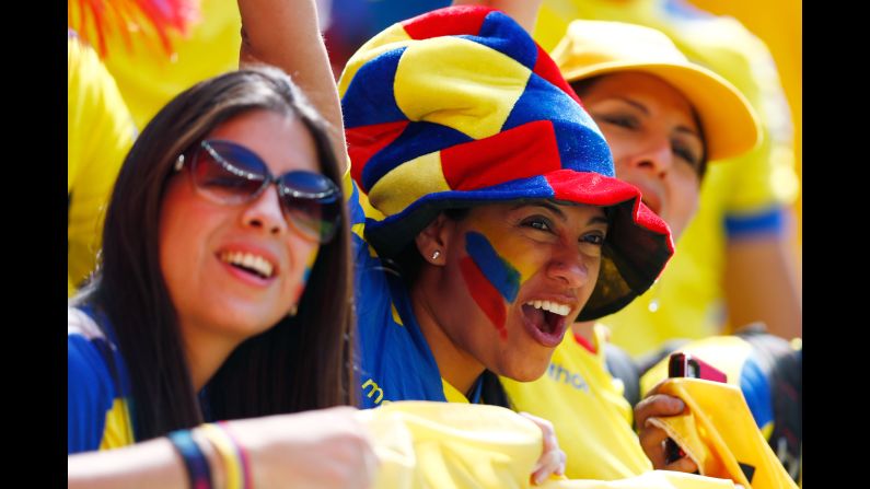 Ecuador fans cheer their team. 