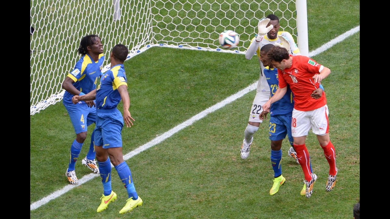 Switzerland's halftime replacement, Admir Mehmedi, scores the equalizer against Ecuador.