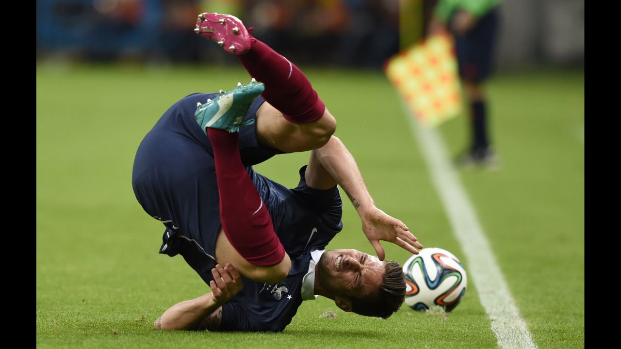 France forward Olivier Giroud takes a tumble.
