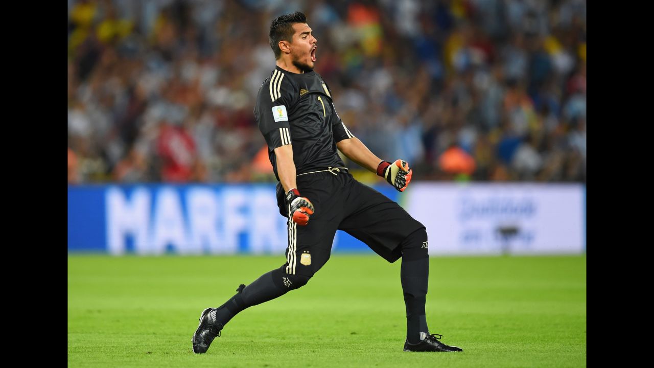 Argentina goalkeeper Sergio Romero celebrates his team's third-minute goal.