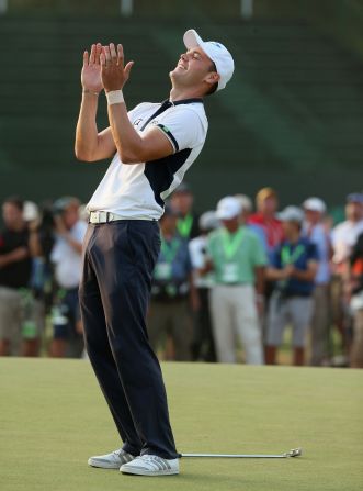 Martin Kaymer celebrates after securing the U.S. Open crown at Pinehurst by an incredible eight shots, becoming the first German to win the tournament in the process.