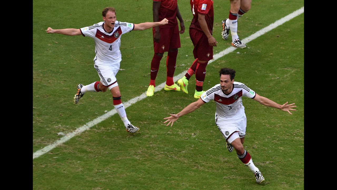 Mats Hummels, right, celebrates after heading in a corner kick to put Germany up 2-0.