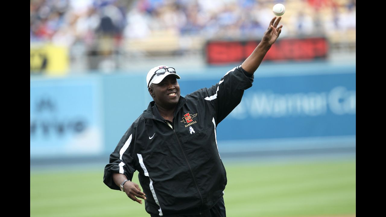 Gwynn throws out the first pitch to his son, Tony Gwynn Jr., before a 2011 game between the Los Angeles Dodgers and the Houston Astros on Father's Day. Gwynn's son was playing for the Dodgers at the time.