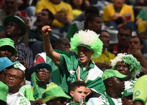 Nigeria fans cheer for their team before the start of the match.