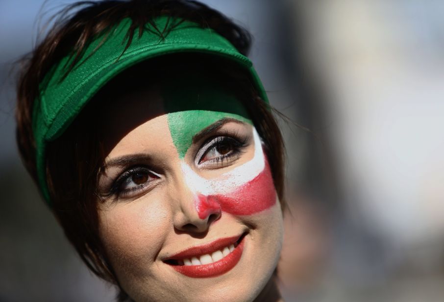 An Iran fan is seen outside the stadium.