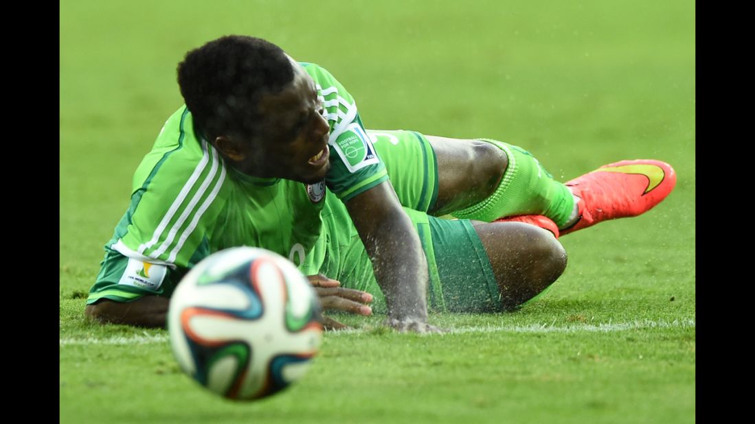 Nigerian forward Emmanuel Emenike takes a fall.