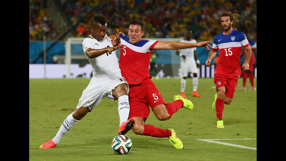 Besler, right, tries to win the ball from Jordan Ayew of Ghana.