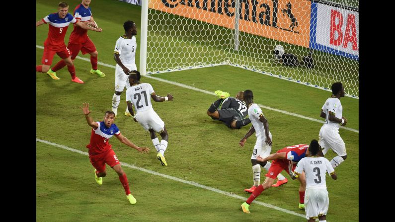 American defender John Brooks, bottom left, celebrates after scoring the winning goal against Ghana during a World Cup match Monday, June 16, in Natal, Brazil. The United States won 2-1 thanks to Brooks' header in the 86th minute.