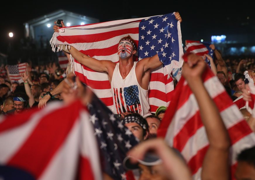 American fans celebrate on Rio de Janeiro's Copacabana beach after the United States beat Ghana 2-1 in a World Cup match Monday, June 16, in Natal, Brazil. Today is the fifth day of the soccer tournament, which is being held in 12 cities across Brazil. <a href="http://www.cnn.com/2014/06/15/football/gallery/world-cup-0615/index.html">See yesterday's best photos</a>