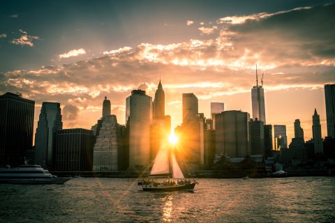 The sun drifts below the New York City skyline on a late June evening. <a href="http://ireport.cnn.com/docs/DOC-1140686">Jeremy Aerts</a> found the perfect spot to drink in the view of the East River at Brooklyn Bridge Park.