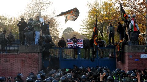 Protesters prepare to break in to the British Embassy on November 29, 2011 in Tehran, Iran.