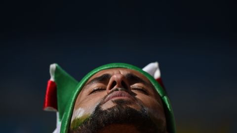 An Algeria fan is pictured prior to the match.